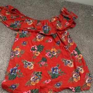 Floral/hawaiian off shoulder shirt.